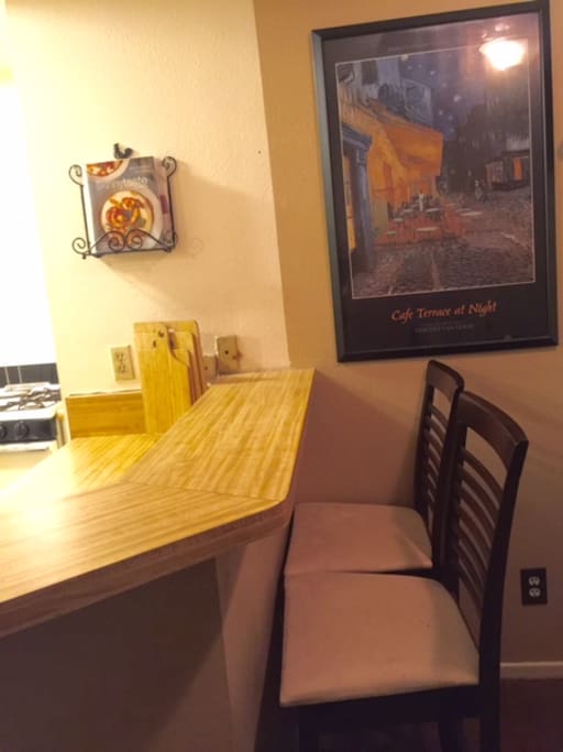 Bar stools and counter top, perfect for a drink!