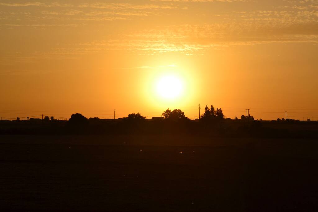 Couché du soleil depuis la terrasse de l'appartement
