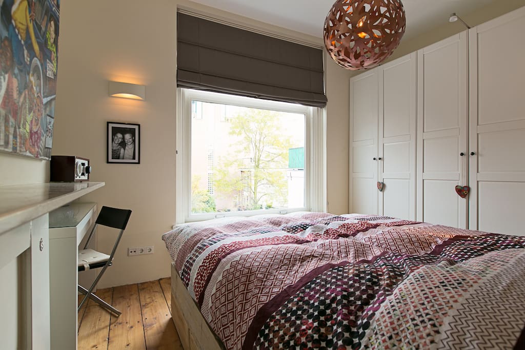 The master bedroom with king-size bed (and make-up table)