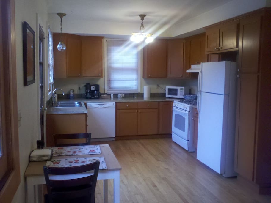 Fully equipped shared kitchen shared by 4 suites