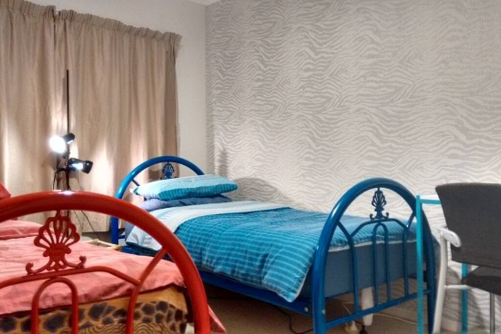 Next room is 2 single beds. Warm and comfy