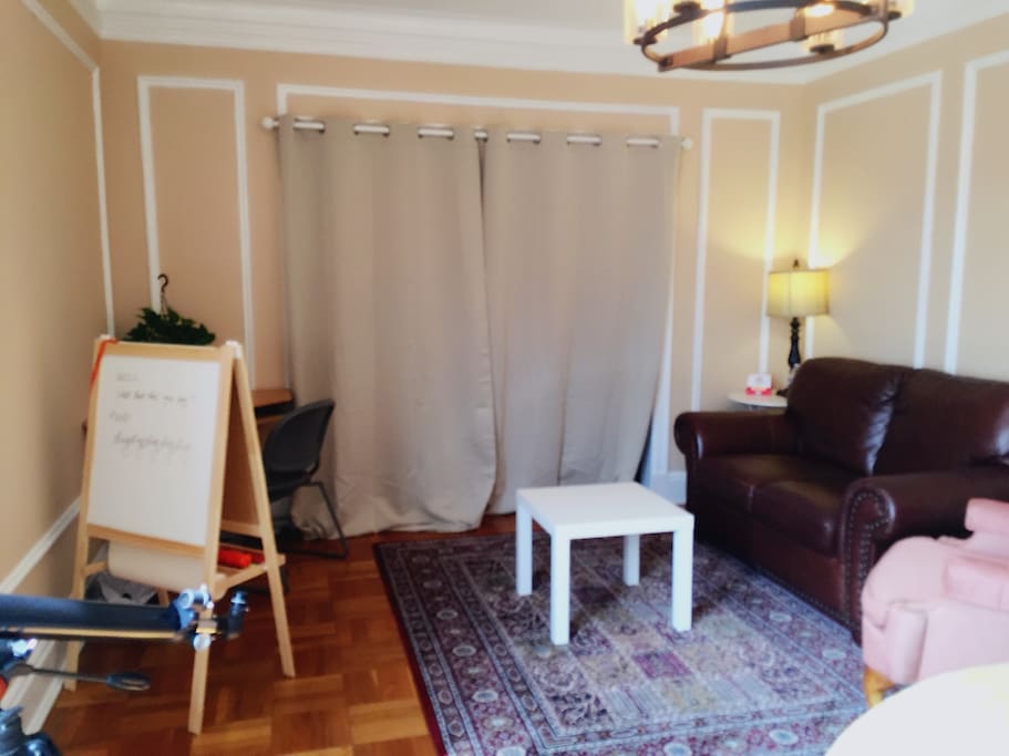 Although the room is converted from a living room, it enjoys privacy with a curtain divided from public places. Also, we will not access to public places after 10 pm to ensure and respect your privacy. Lastly, please be noted that this room is almost twice as big as standard bedrooms.