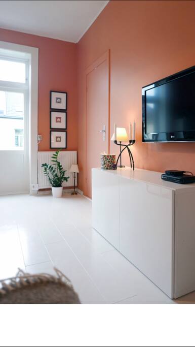 Livingroom with door out to a small balcony