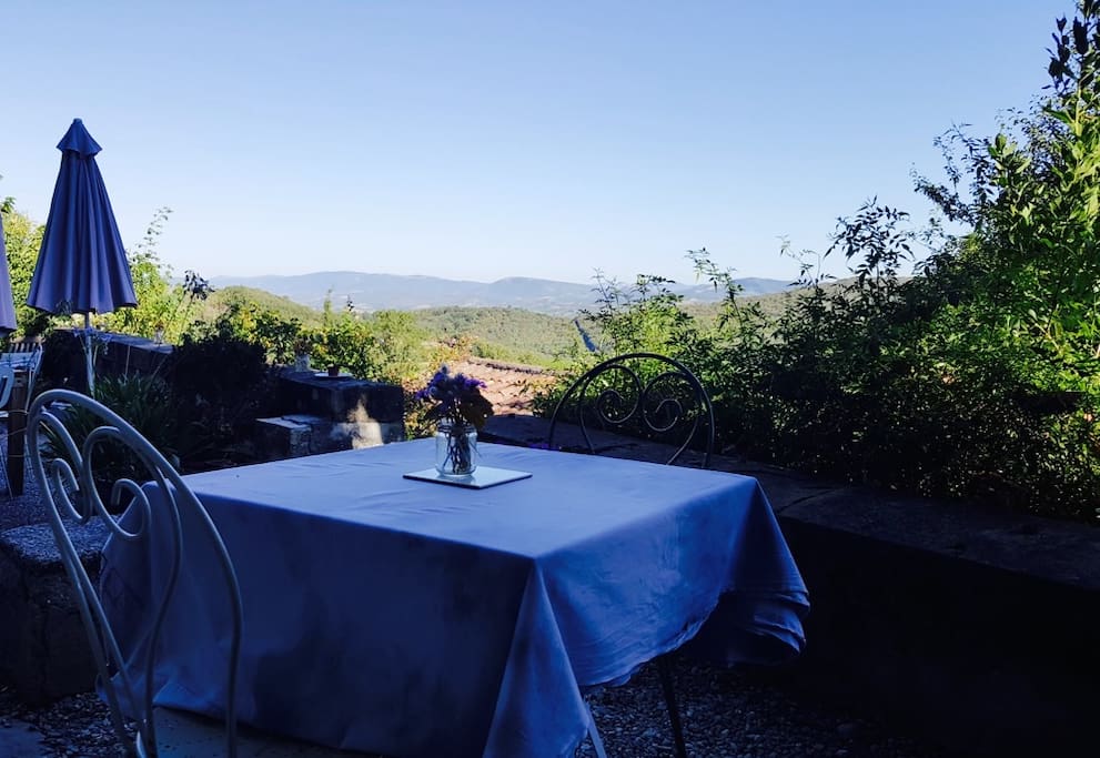 Part of the main back terrace - with a private BBQ and bistro table and chairs.
