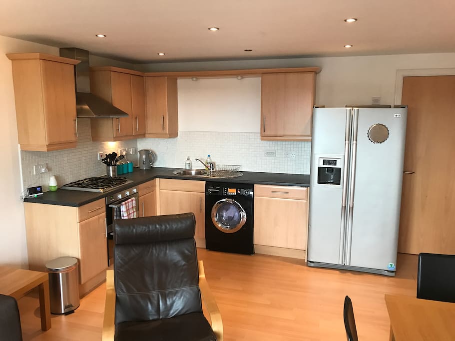 Well Equipped Kitchen with Washing Machine and Dishwasher