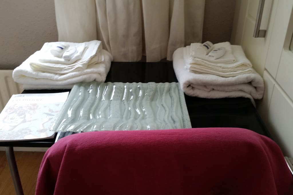 Fresh towels and shampoo and body wash