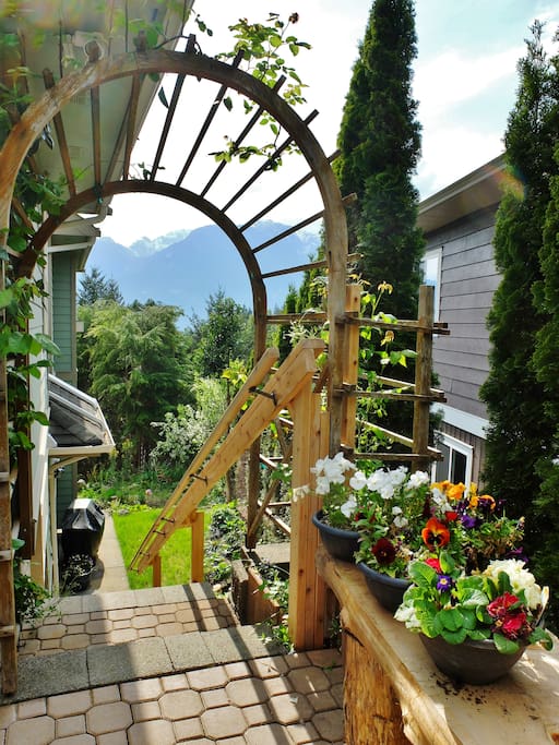Walk through the arch and enjoy the gorgeous views as you walk down to your suite. On warm summer nights enjoy cooking on the BBQ outside your suite.