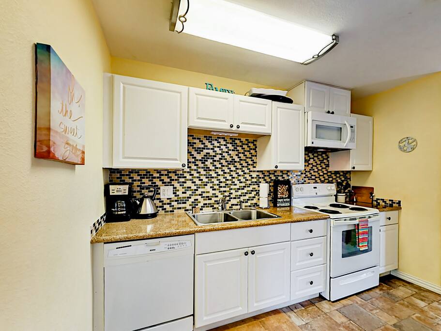 Prepare meals with ease in the roomy, well-equipped kitchen.