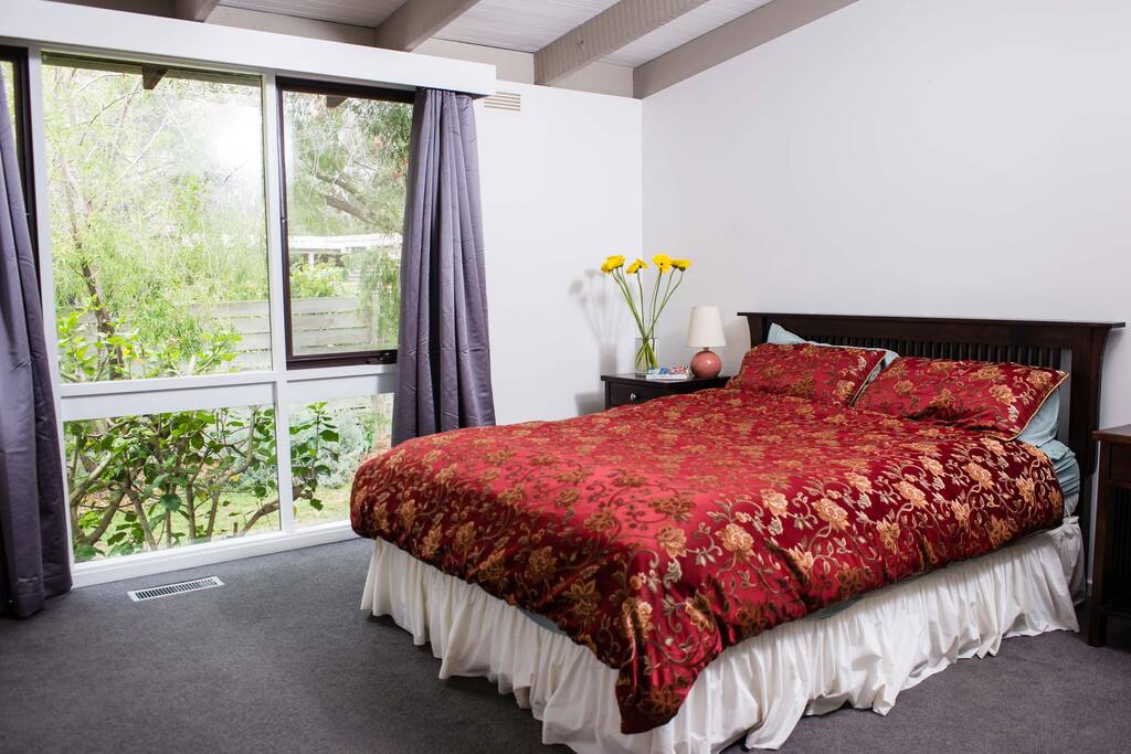 Large main bedroom with queen bed