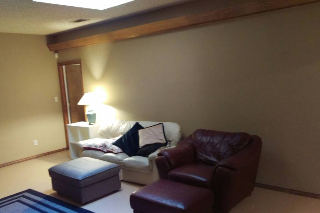 living room, HD TV with High speed 6 MG internet.