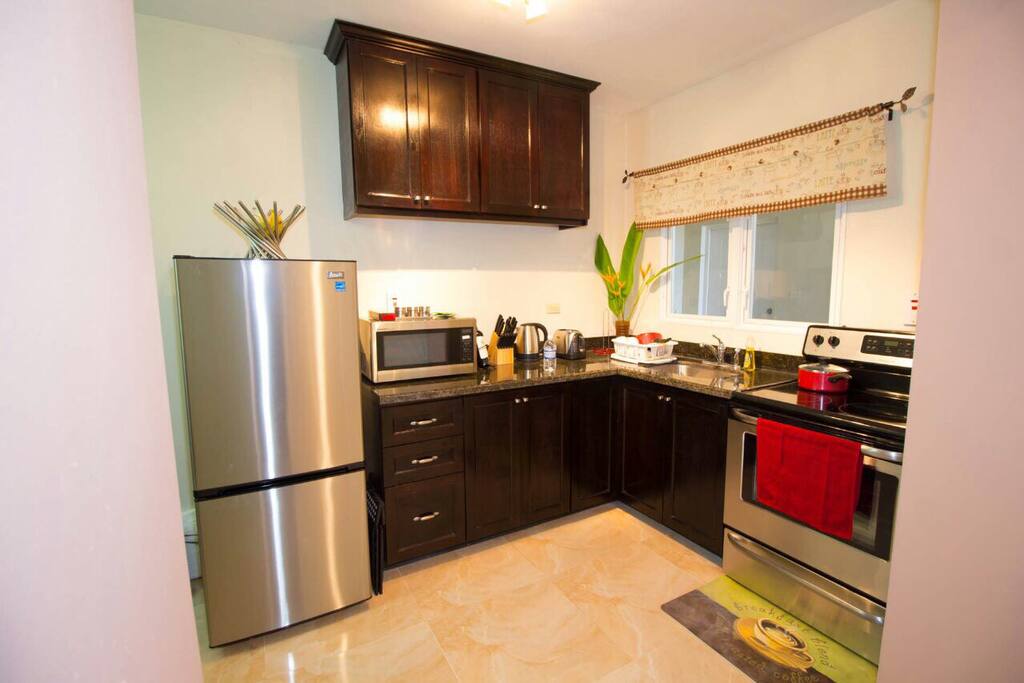 Modern stainless steel kitchen amenities.