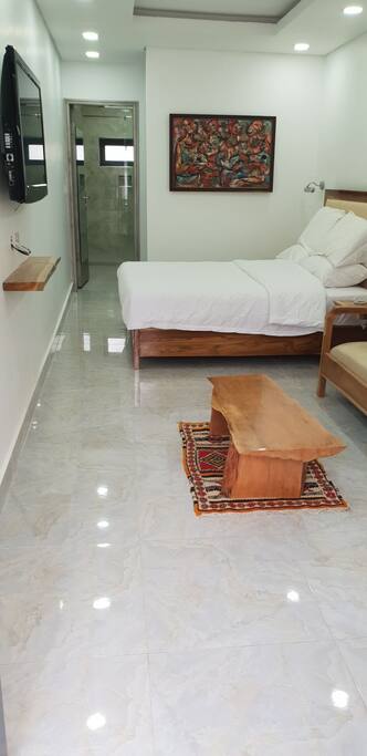 Studio room with Pool view, quality handcrafted furniture & art works.