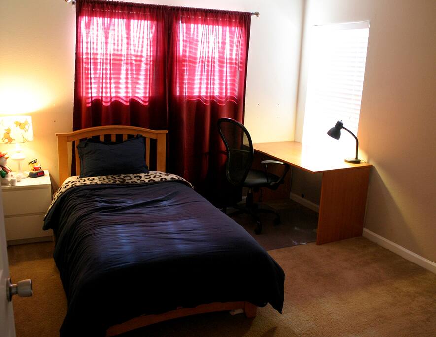 Twin bed and a desk