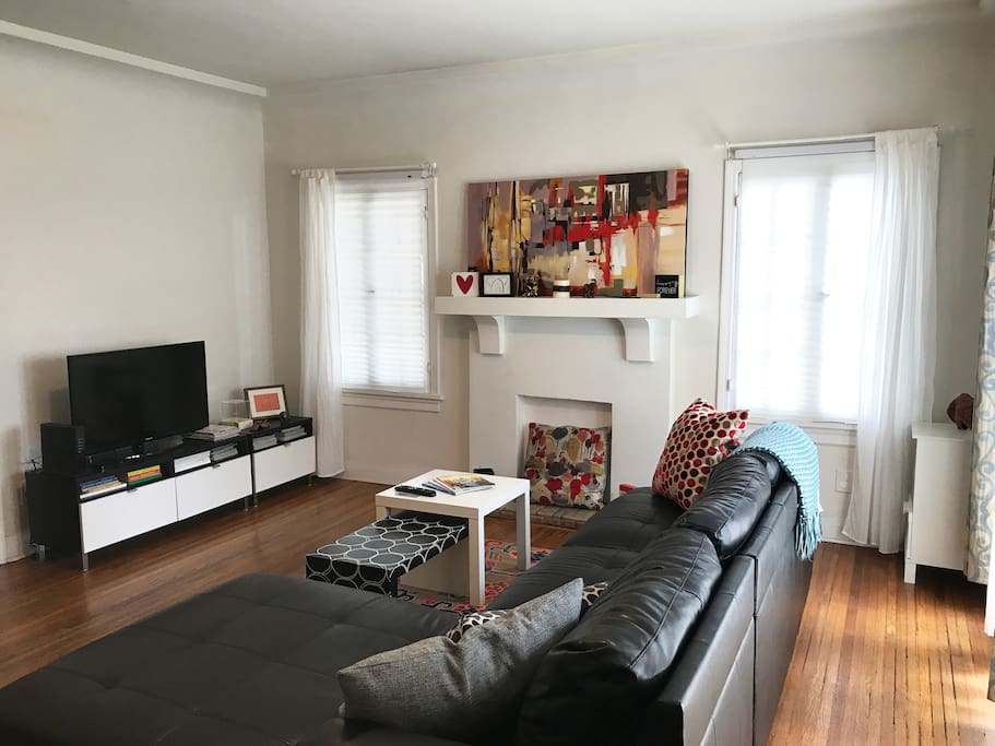 One person can sleep comfortably on the sectional sofa.