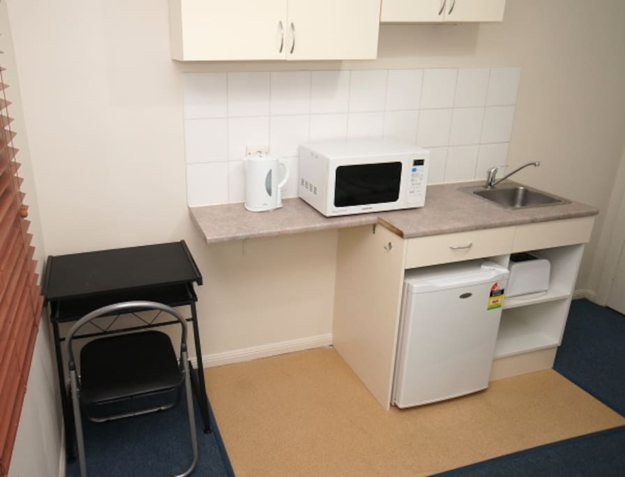 Kitchenette and small working desk in your room