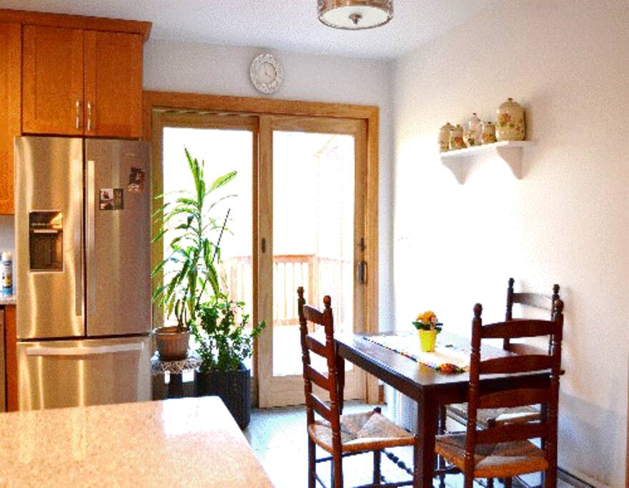 eat in kitchen that opens to a private deck.