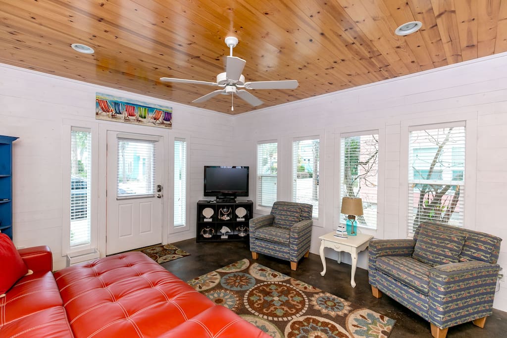 Guests can enjoy the 36" Vizio TV in the living room