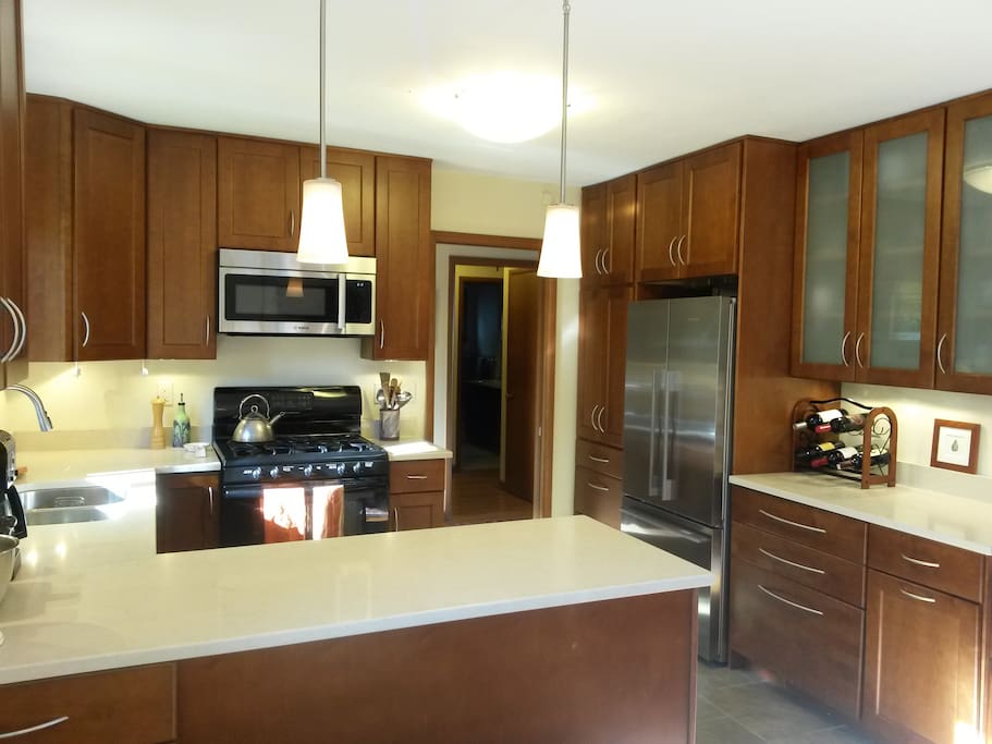 Updated kitchen with dishwasher, microwave, and all the amenities for those who enjoy cooking.