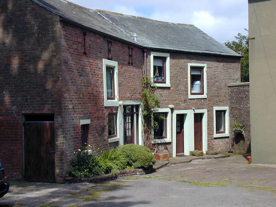 Coach House is the left hand cottage