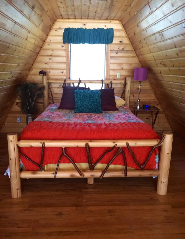 The Queen bed in the loft. I slept here every night for over 3 years, and I loved it! It's a fabulous bed!