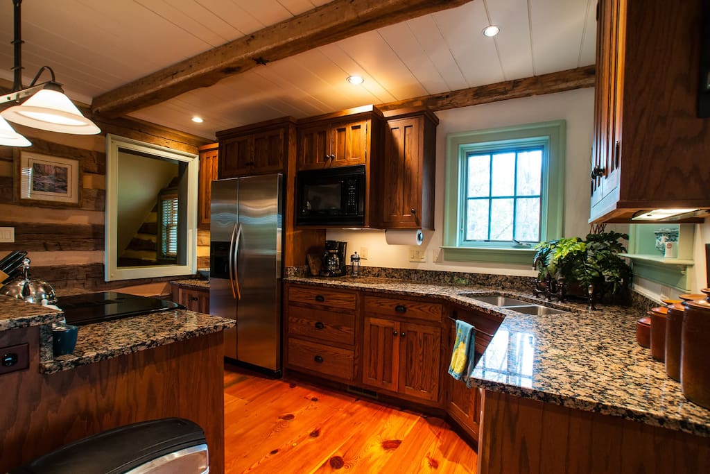 Kitchen, new granite, heart pine floors, wide boards-recycled