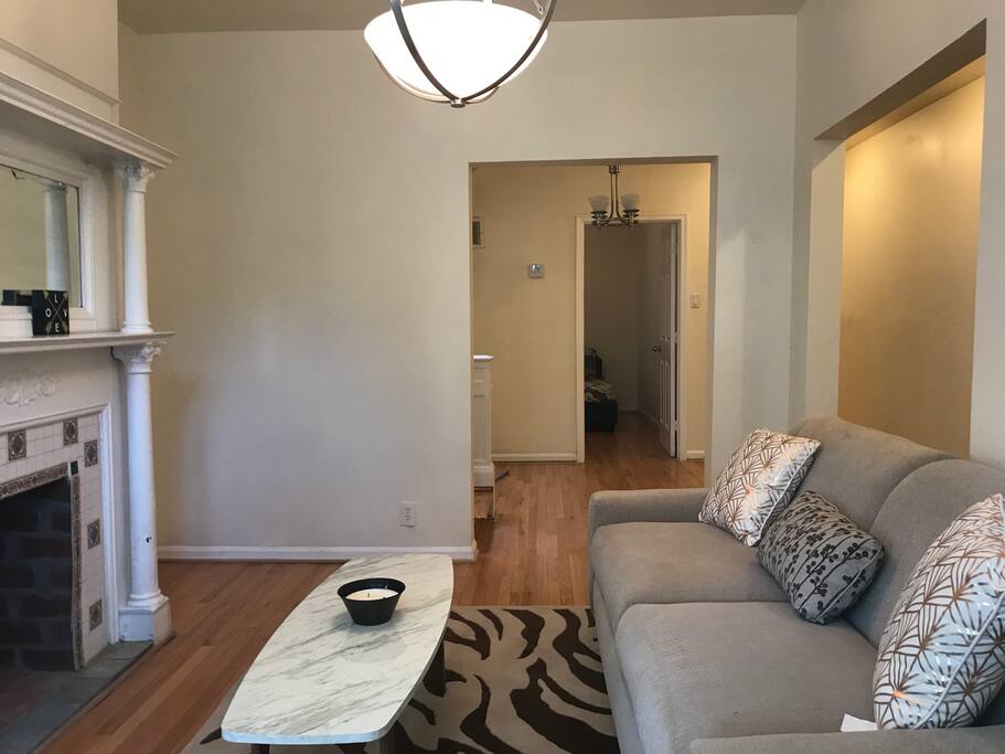 Living Room with open entrances.