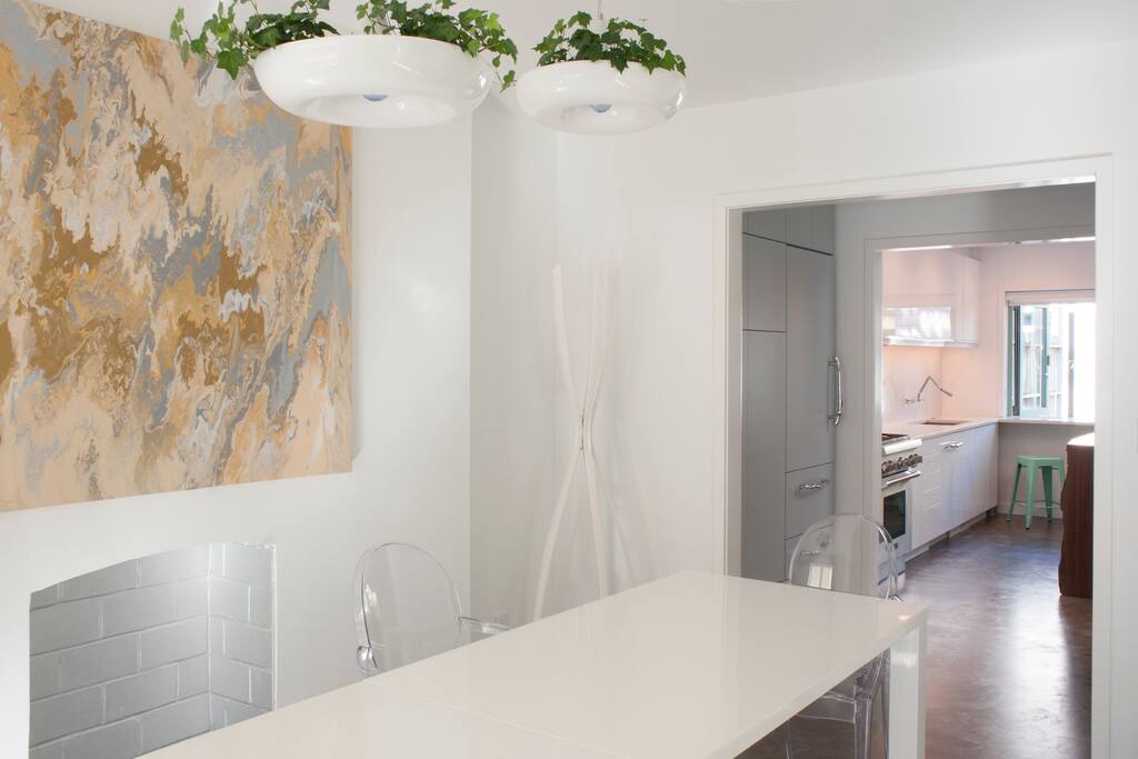 First floor dining room, refrigerator nook, and kitchen entry