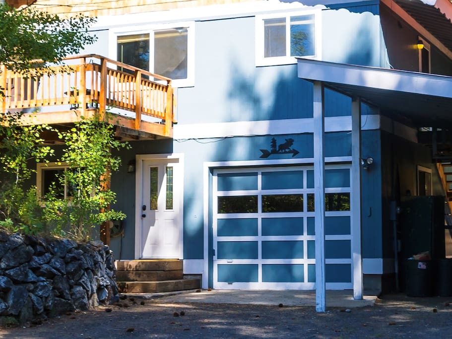 Entrance and deck area. Deck fits 2 tables, 8 seats! Small fire pit to enjoy as well