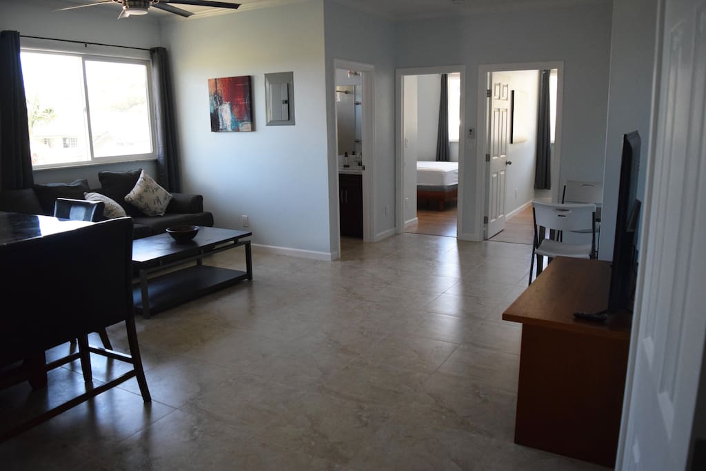 View of the living room. The unit has 9 ft ceiling with AC