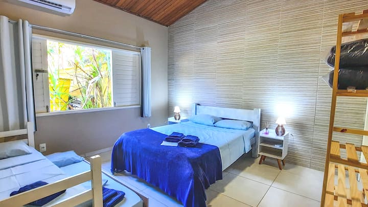 Suite 3 -  1 full bed, 1 single bed, 1 single bed, bathroom and air conditioning.