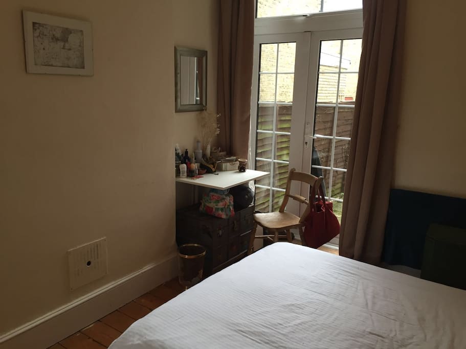 Guest room with patio doors onto the garden