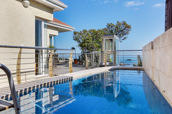 Relax & admire the views over the breaking waves