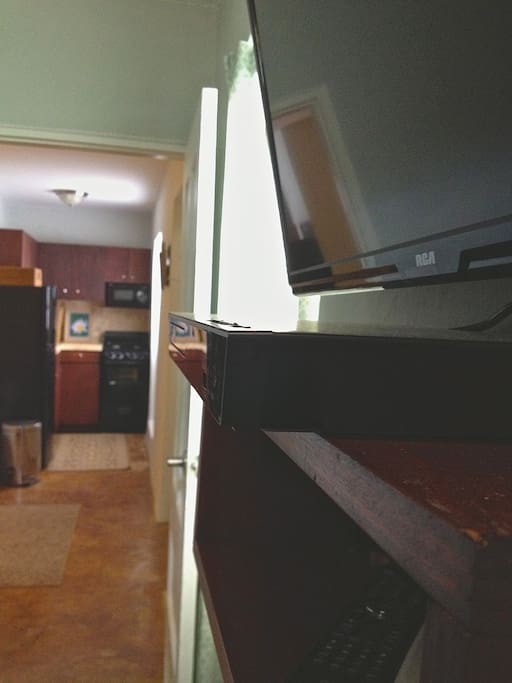 View from the bedroom of kitchen area. TV, Smart DVD player (access to Netflix, Hulu+, etc..)