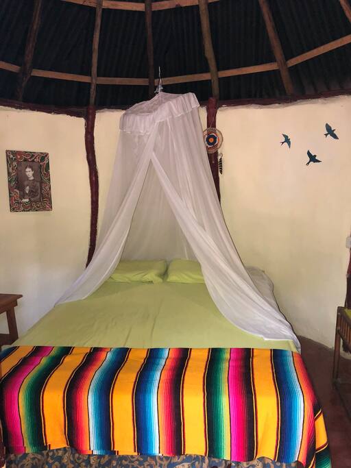 Inside of cabana with one bed