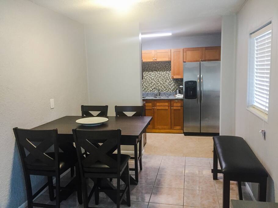Dining Area with table height outlets for plugging in your electronics.