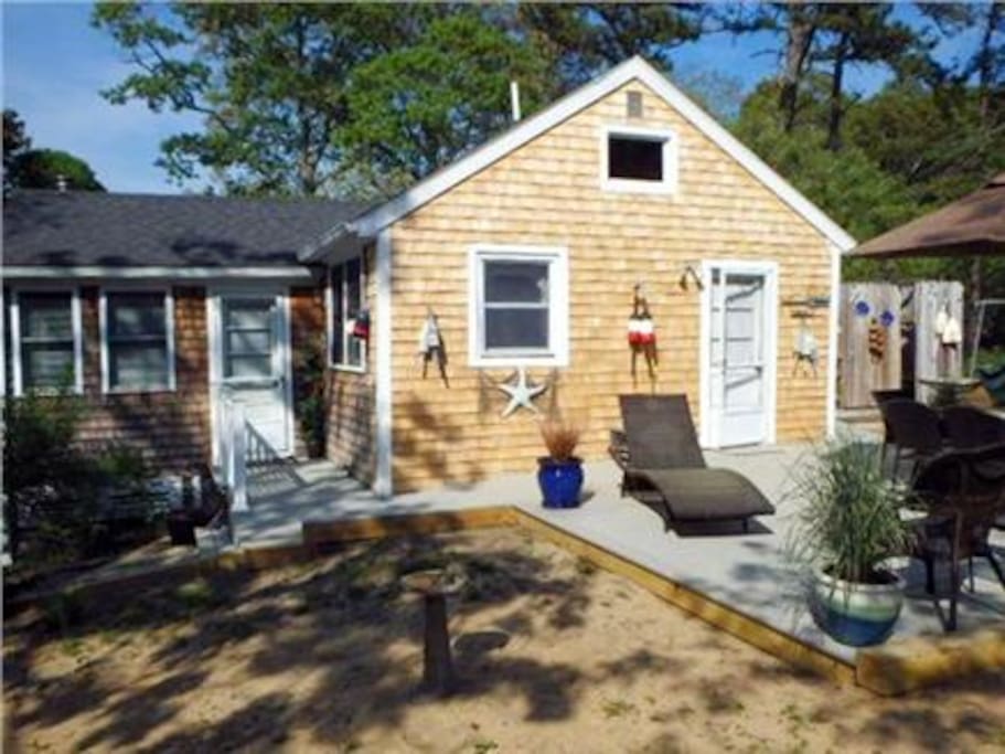 Side view. of cottage with new decking