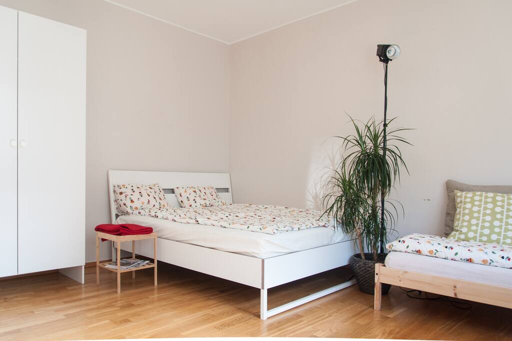 Main bedroom double bed and side bed.