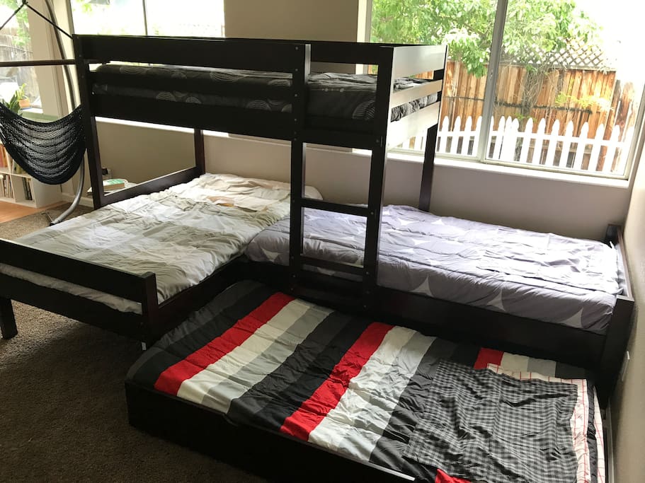 4 Twin Beds in Family Room