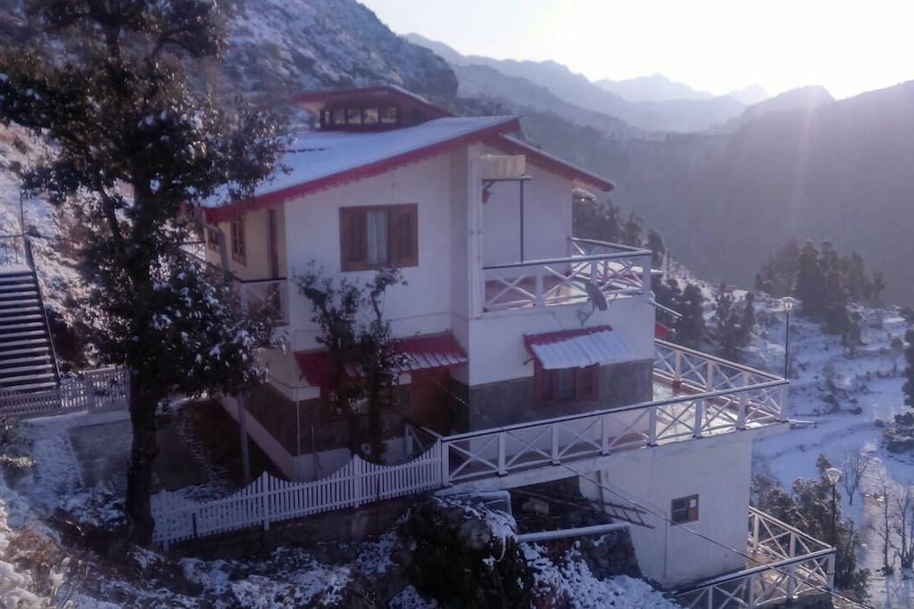 Snow clad view of cottage