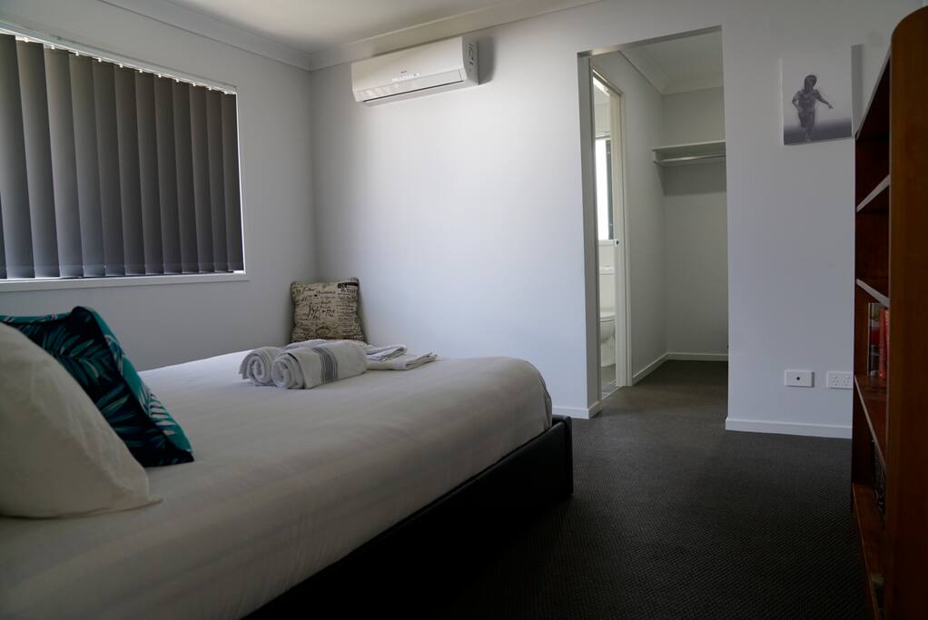 Spacious walking robe, private bathroom and air-conditioner