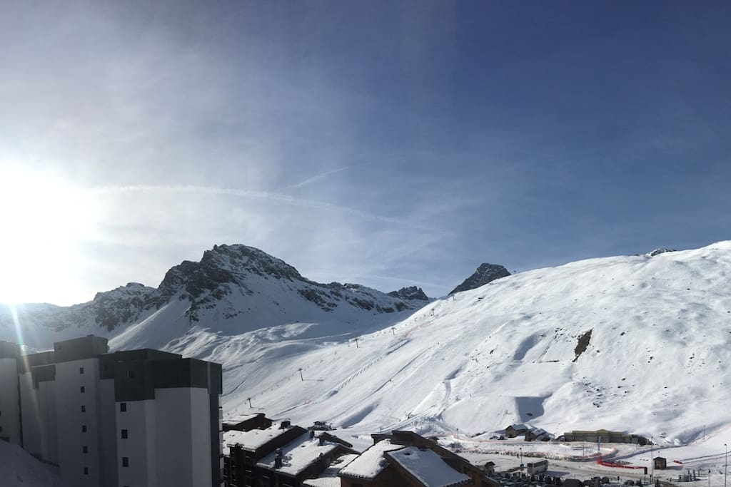 Wake up to the beautiful mountains, check the snow conditions and go! This is the view from the balcony.