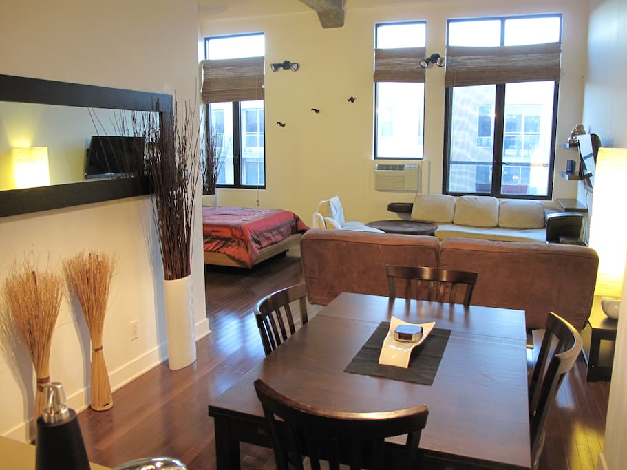 OPEN SPACE WITH GREAT DECOR & QUALITY FURNITURE. 20 FT CEILINGS & HUGE WINDOWS