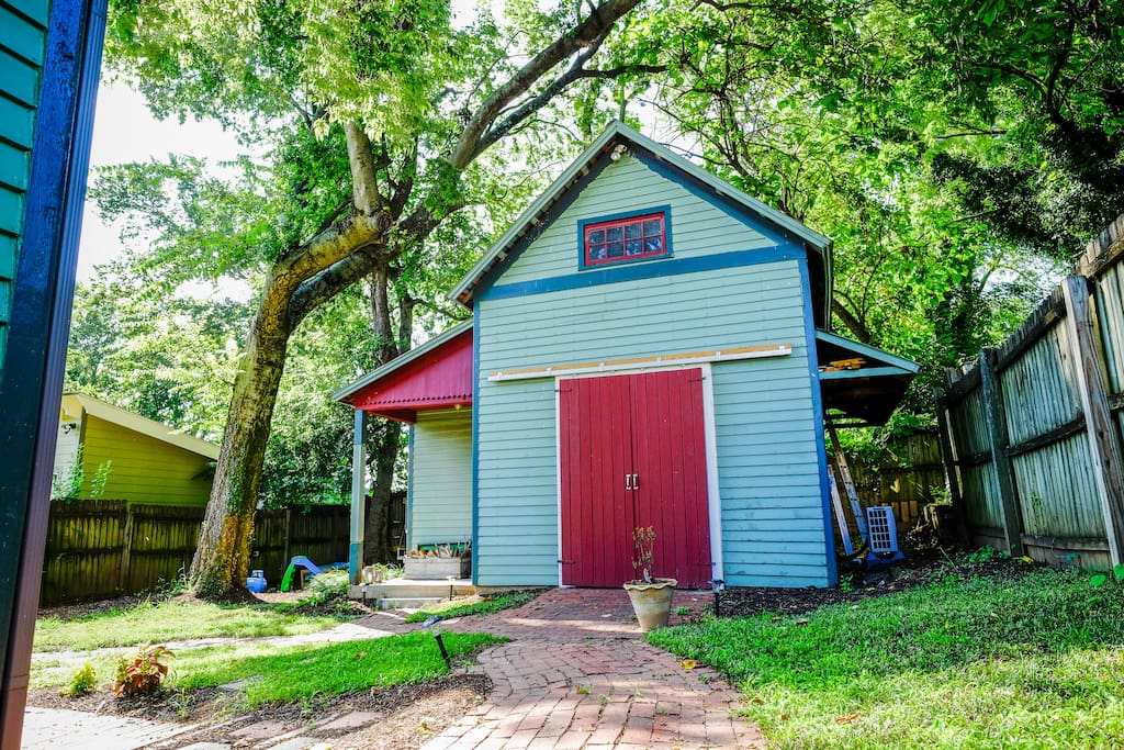 Trees surround the house, keeping it cool in the summer