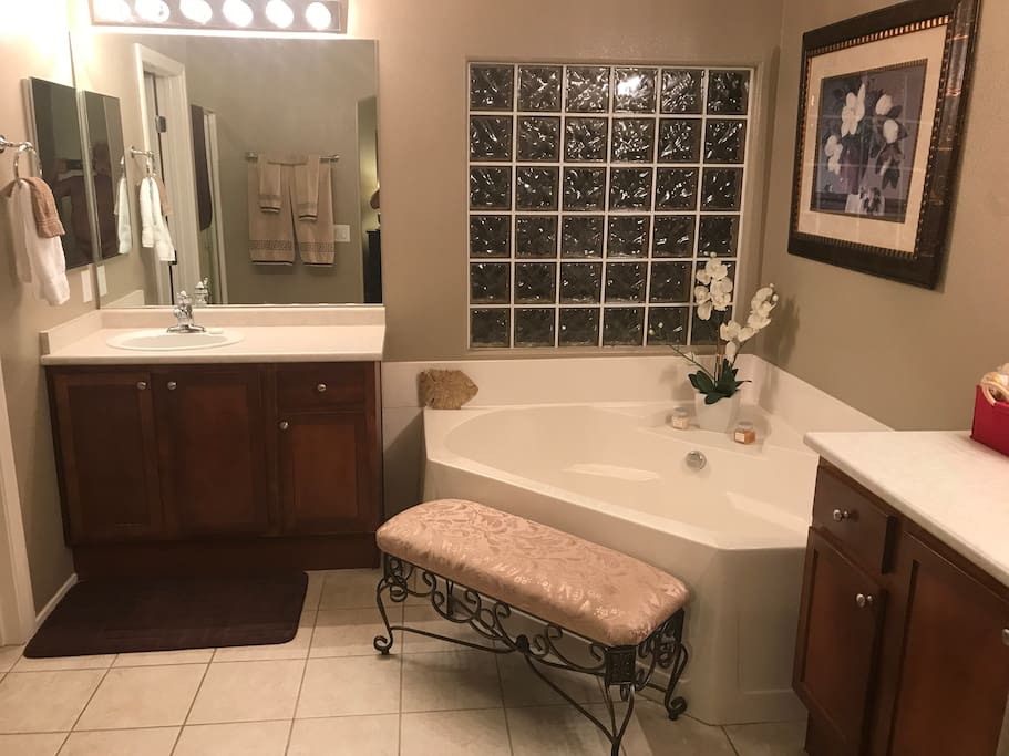 Large his and Her sinks in Master Bathroom with Huge Soaking Tub