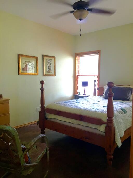 Comfortable queen bed with plenty of room for unpacking and settling in.