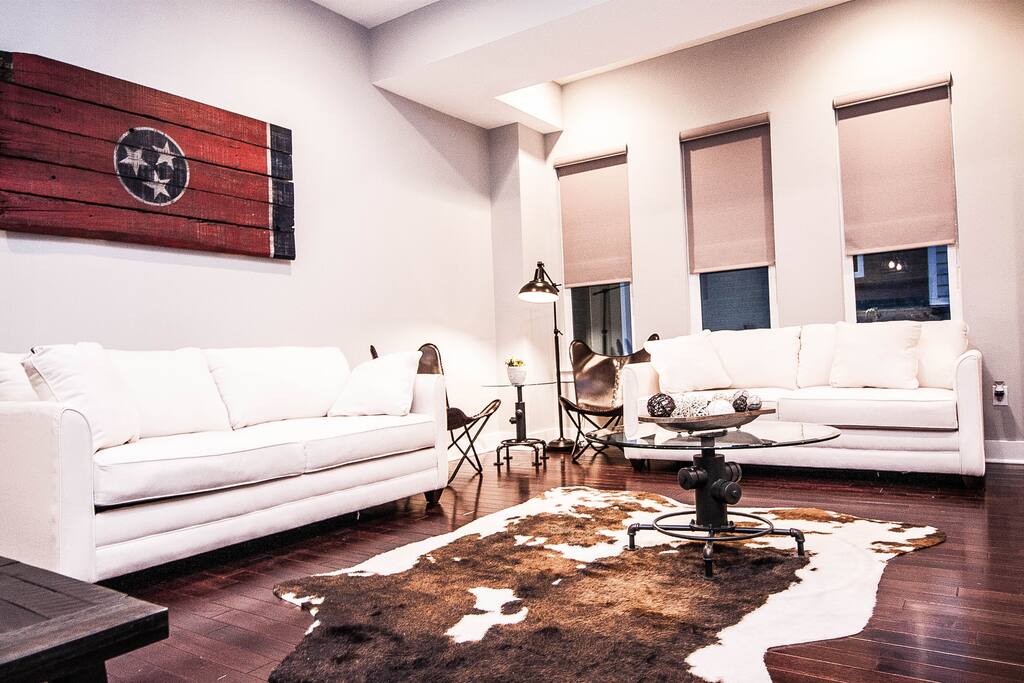 Living room with 2 queen sleeper sofas