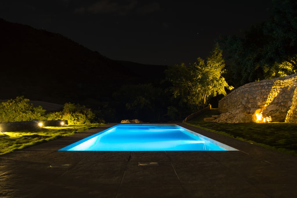 Swimming pool at night. The colors of the pool can be changed.