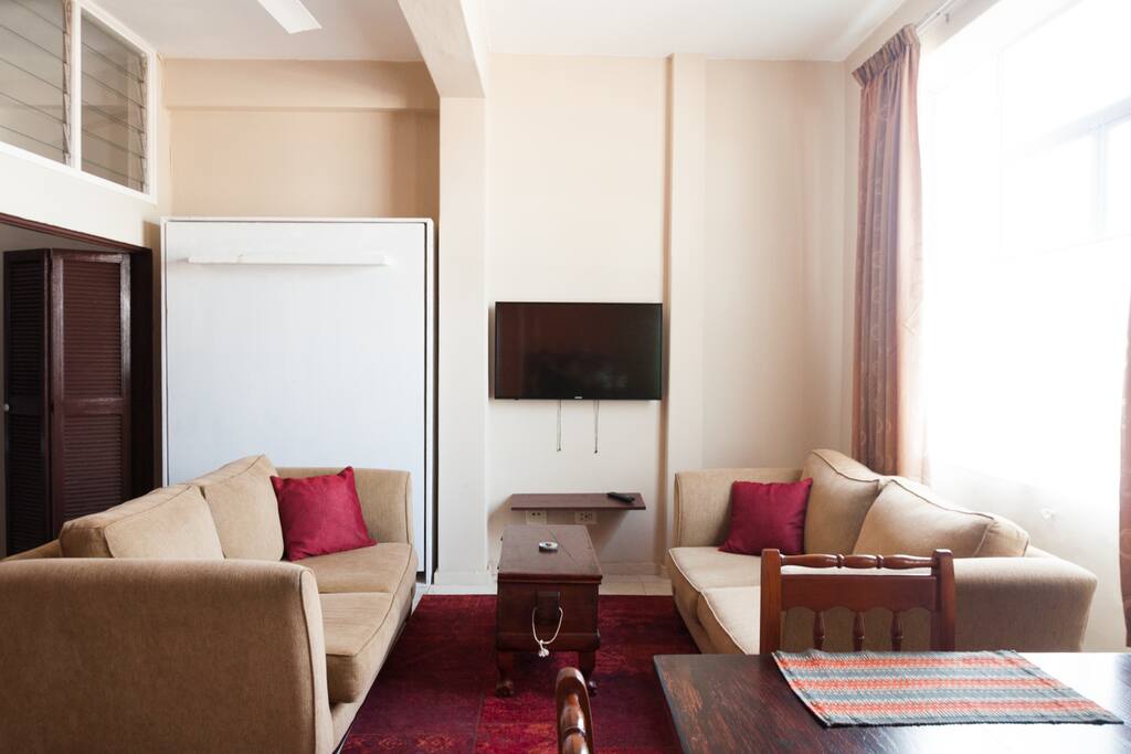 Open plan lounge has DSTV and the whole apartment has free WIFI.