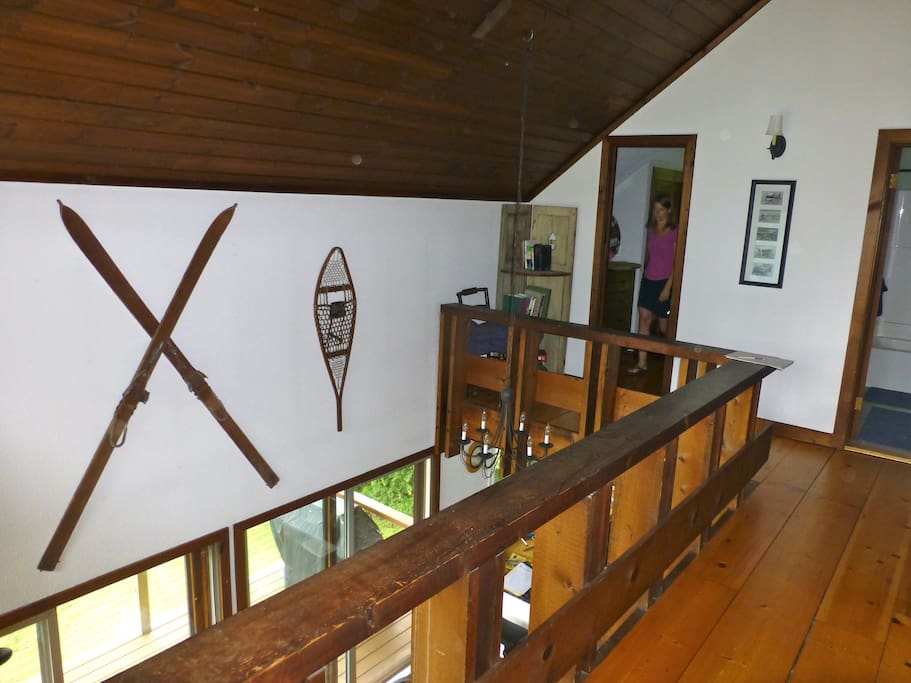 Upstairs balcony with vaulted ceiling