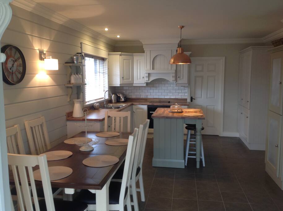 Lovely kitchen/diner which leads to sun lounge.